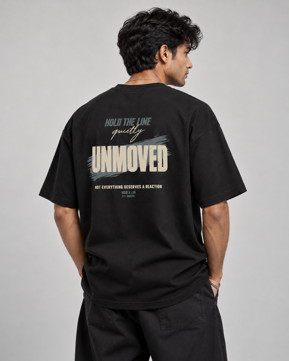 Noir & Lin UNMOVED oversized graphic tee in Black, lifestyle photo 2 (AI-generated model image)