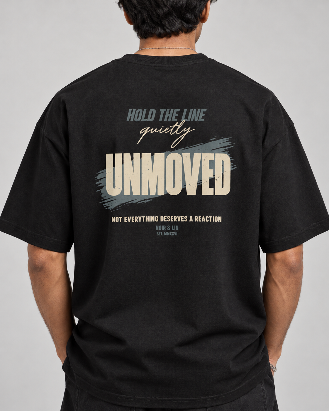 Noir & Lin UNMOVED oversized graphic tee in Black, lifestyle photo 1 (AI-generated model image)