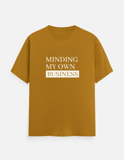 Minding My Own Business Tee – Unisex Regular Fit – Noir & Lin India Mustard Yellow