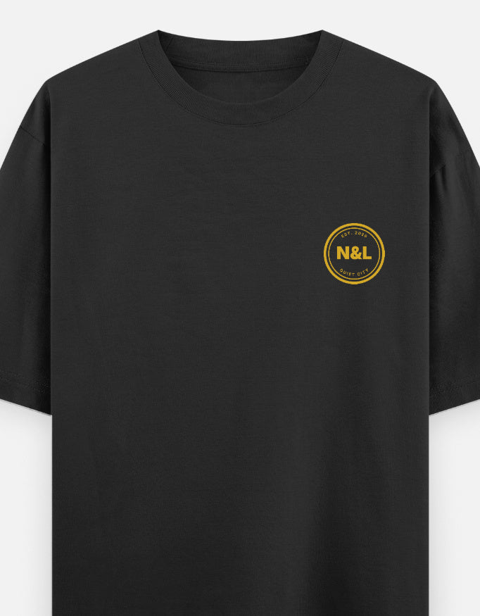 Noir & Lin QUIET CITY oversized graphic tee in Black, left chest print detail