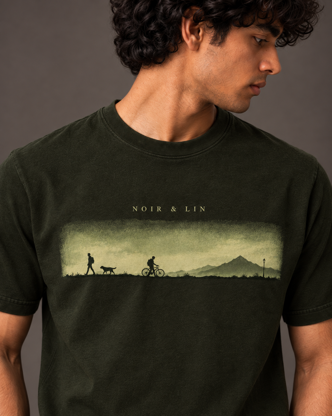 Noir & Lin Long Way Home graphic tee in Olive Green, lifestyle photo 1 (AI-generated model image)