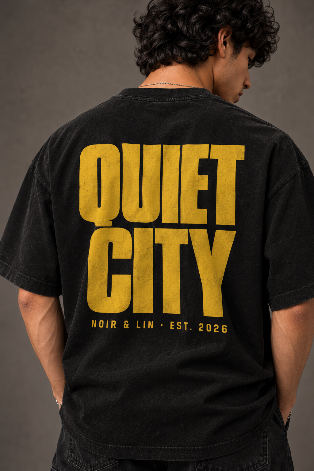 Noir & Lin QUIET CITY oversized graphic tee in Black, portrait (AI-generated model image)
