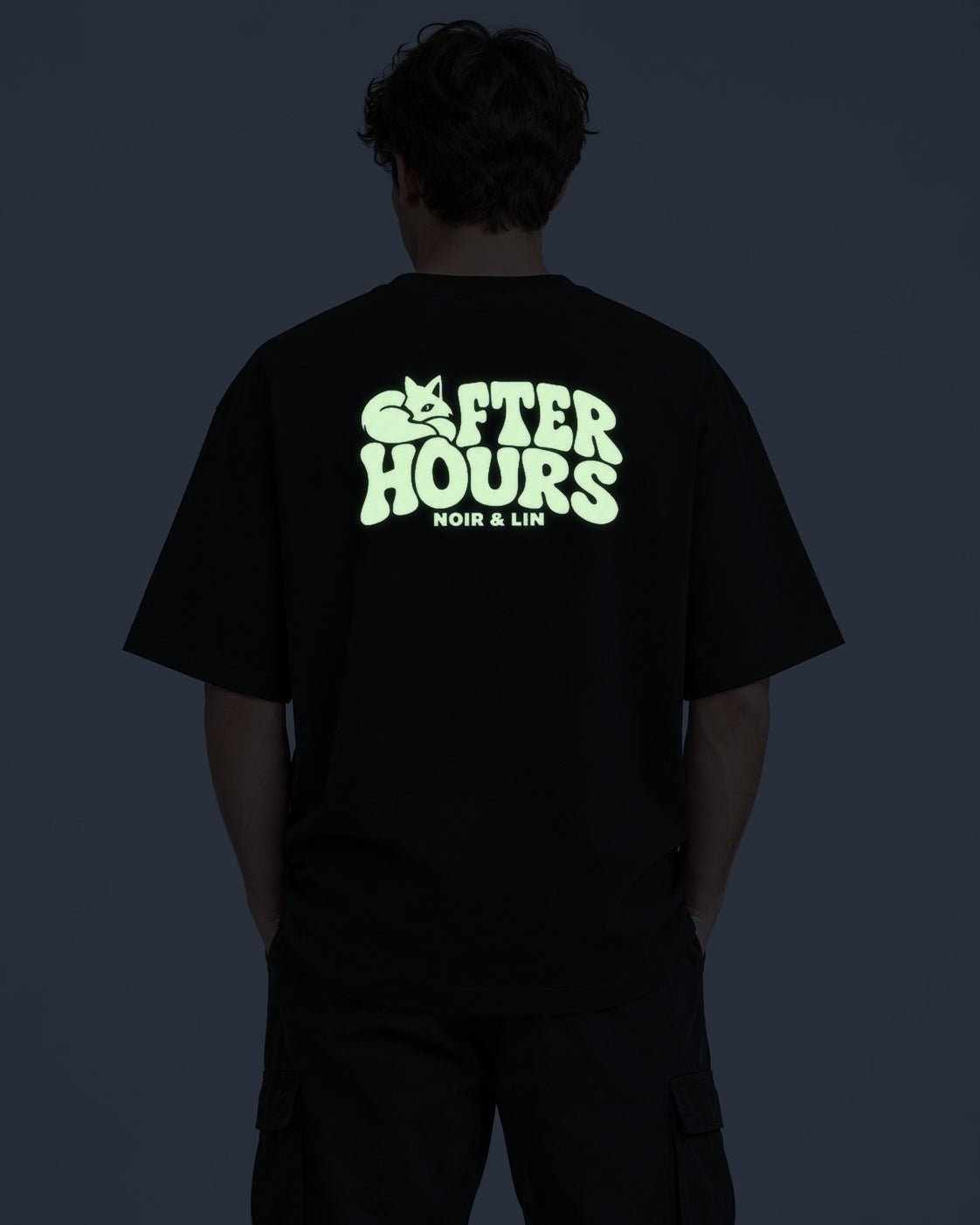 Noir & Lin AFTER HOURS Glow in the Dark tee in Black, back print glowing at night