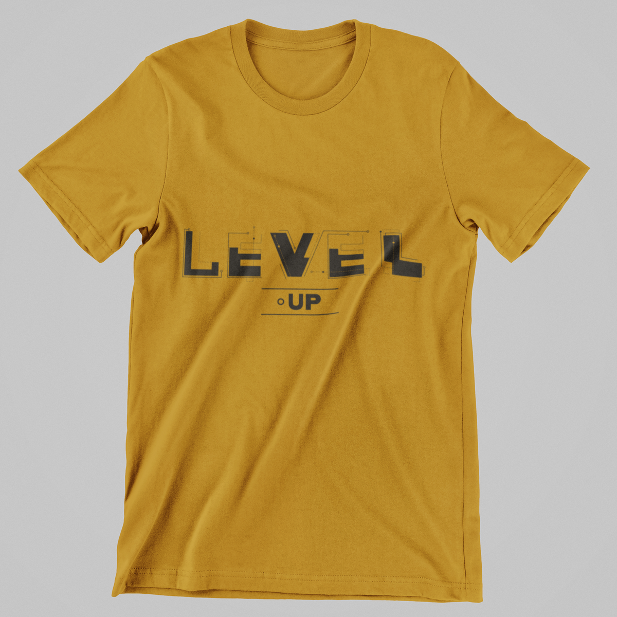 Level-Up graphic t-shirt in mustard yellow, back print, 180 GSM cotton | Noir & Lin