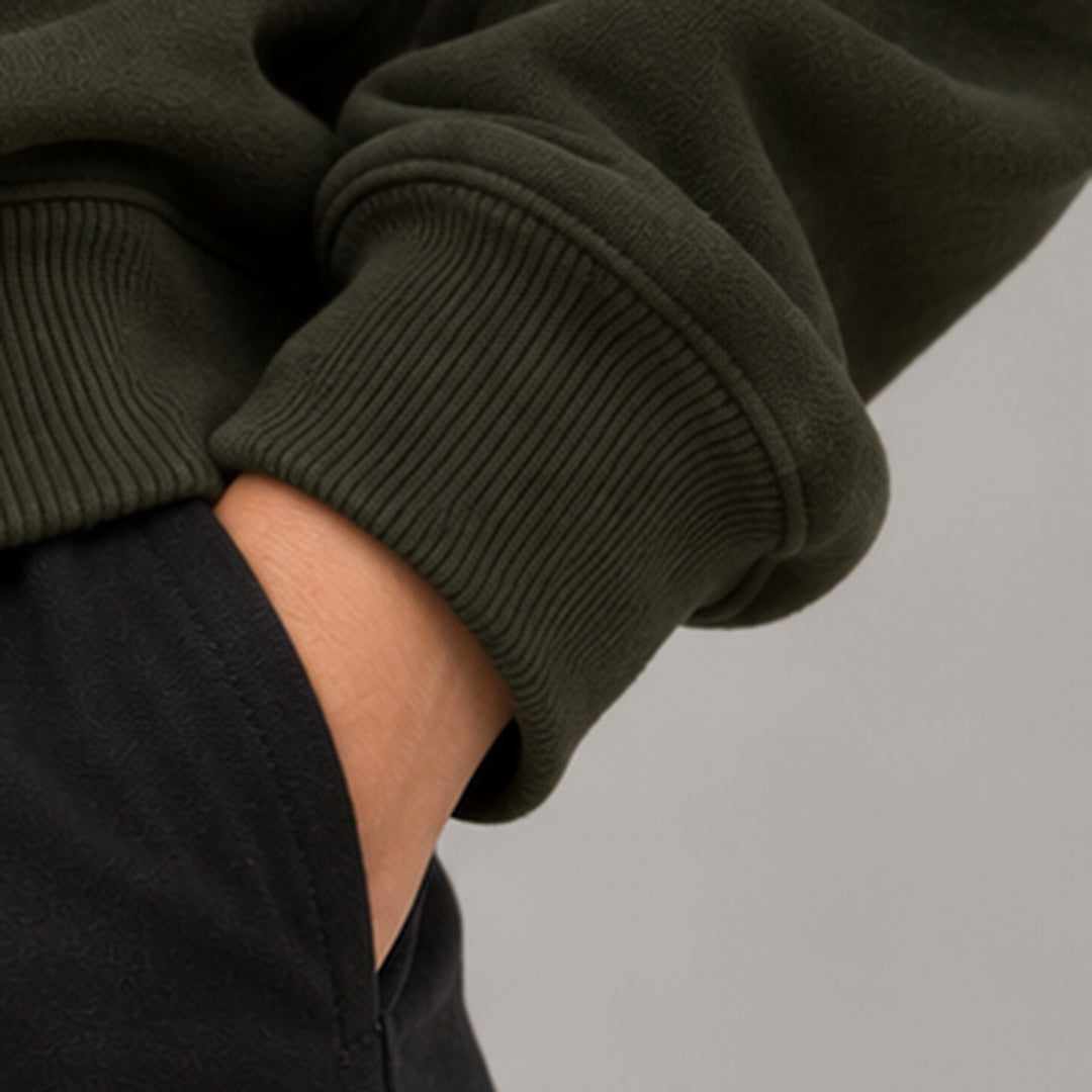 Noir & Lin QUIET STRENGTH sweatshirt in Olive Green, ribbed cuff close-up