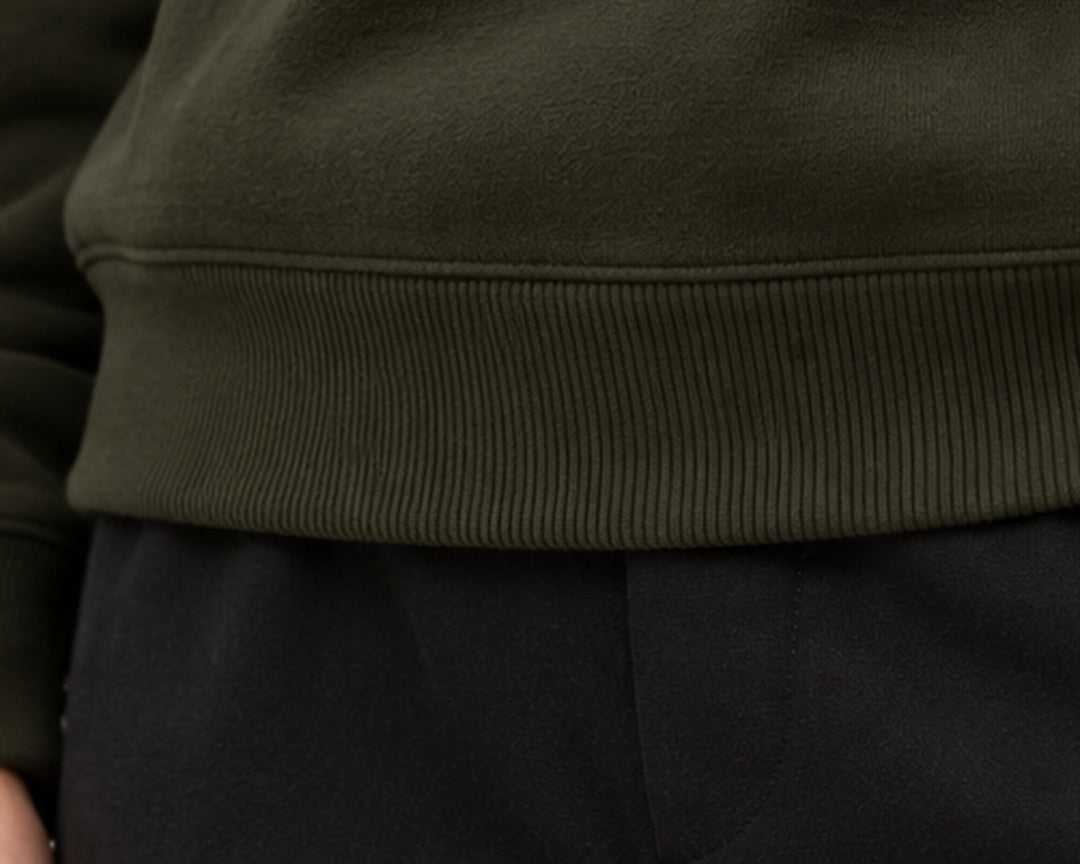 Noir & Lin QUIET STRENGTH sweatshirt in Olive Green, hem rib close-up